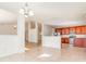 Spacious living room featuring open layout, tile flooring, and natural light at 36502 Barrington Dr, Eustis, FL 32736