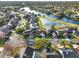 Aerial view of houses and lake at 388 Westwind Ct, Lake Mary, FL 32746