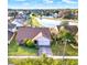 Aerial view of a single-Gathering home with a lake view in a residential neighborhood at 388 Westwind Ct, Lake Mary, FL 32746