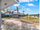 Backyard with patio, pond view, and fence at 388 Westwind Ct, Lake Mary, FL 32746