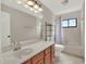 Bathroom with single vanity and tub shower at 388 Westwind Ct, Lake Mary, FL 32746
