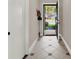 Neat and clean entryway with tile flooring and access to the backyard at 388 Westwind Ct, Lake Mary, FL 32746