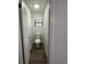 Clean and updated half bathroom with new toilet and flooring at 4010 Winderlakes Dr, Orlando, FL 32835