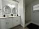 Modern bathroom with double vanity and walk-in shower at 4010 Winderlakes Dr, Orlando, FL 32835