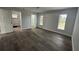 Bright bedroom with walk-in closet and wood-look floors at 4010 Winderlakes Dr, Orlando, FL 32835