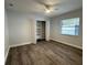 Well-lit bedroom with large closet and ceiling fan at 4010 Winderlakes Dr, Orlando, FL 32835