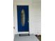 Blue front door with a decorative glass window at 4010 Winderlakes Dr, Orlando, FL 32835