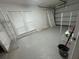 Garage with shelving and additional storage options at 4010 Winderlakes Dr, Orlando, FL 32835