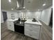 Modern kitchen with white cabinets and a large island at 4010 Winderlakes Dr, Orlando, FL 32835