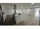 Modern kitchen with island and stainless steel appliances at 4010 Winderlakes Dr, Orlando, FL 32835