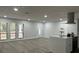 Bright living room with hardwood floors and large windows at 4010 Winderlakes Dr, Orlando, FL 32835