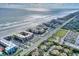 Aerial view of oceanfront property and parking at 4175 S Atlantic Ave # 4070, New Smyrna Beach, FL 32169