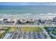 Aerial view of beachfront property with ocean views and nearby amenities at 4175 S Atlantic Ave # 4070, New Smyrna Beach, FL 32169
