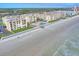 Beachfront property aerial view, showing building, beach and ocean at 4175 S Atlantic Ave # 4070, New Smyrna Beach, FL 32169