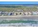Aerial view of oceanfront buildings and beach at 4175 S Atlantic Ave # 4070, New Smyrna Beach, FL 32169