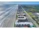 Aerial view of beachfront buildings and ocean at 4175 S Atlantic Ave # 4070, New Smyrna Beach, FL 32169