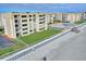 Aerial view of beachside condos with oceanfront location and grassy areas at 4175 S Atlantic Ave # 4070, New Smyrna Beach, FL 32169