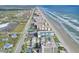 Aerial view of beachfront property with ocean and building views at 4175 S Atlantic Ave # 4070, New Smyrna Beach, FL 32169