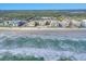 Aerial view of beachfront community with ocean view and lush landscape at 4175 S Atlantic Ave # 4070, New Smyrna Beach, FL 32169