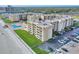Aerial view of building, pool, and beach at 4175 S Atlantic Ave # 4070, New Smyrna Beach, FL 32169