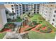 Lovely courtyard with lush landscaping and walkways at 4175 S Atlantic Ave # 4070, New Smyrna Beach, FL 32169