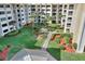 Peaceful courtyard with lush landscaping and seating at 4175 S Atlantic Ave # 4070, New Smyrna Beach, FL 32169