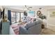 Bright living room with comfy sofas, ocean views, and beachy decor at 4175 S Atlantic Ave # 4070, New Smyrna Beach, FL 32169