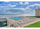 Oceanfront pool and deck with shuffleboard at 4175 S Atlantic Ave # 4070, New Smyrna Beach, FL 32169