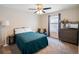 Bedroom with window, ceiling fan and dresser at 4567 Tribute Trl, Kissimmee, FL 34746