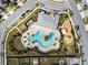 Aerial view of community pool and playground at 4567 Tribute Trl, Kissimmee, FL 34746