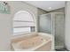 Bathroom with a large garden tub and separate shower at 4721 Spaniel St, Orlando, FL 32818