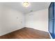 Simple bedroom with double closets and wood-look floors at 4800 Pierce Arrow Dr, Apopka, FL 32712