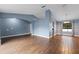 Dining room with hardwood floors and view of backyard at 4800 Pierce Arrow Dr, Apopka, FL 32712