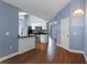 Modern kitchen with stainless steel appliances and an island at 4800 Pierce Arrow Dr, Apopka, FL 32712