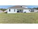 Spacious backyard with lush grass, ideal for outdoor activities and relaxation at 5000 Northern Dove Ave, Mount Dora, FL 32757