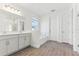 Spacious bathroom featuring double vanity, soaking tub, and tiled shower at 5000 Northern Dove Ave, Mount Dora, FL 32757