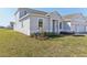 Charming single-story home showcasing well-maintained landscaping and a inviting facade at 5000 Northern Dove Ave, Mount Dora, FL 32757