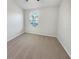 Spacious bedroom with neutral walls and plush carpeting at 510 Rainbow Springs Loop, Groveland, FL 34736