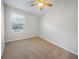 Bright bedroom with neutral walls and carpet flooring at 510 Rainbow Springs Loop, Groveland, FL 34736