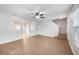 Bright living room with hardwood floors and high ceilings at 510 Rainbow Springs Loop, Groveland, FL 34736