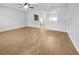 Spacious living area with hardwood flooring and an open floor plan at 510 Rainbow Springs Loop, Groveland, FL 34736