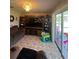 Living room with patio access and lots of natural light at 517 Cardinal Dr, Kissimmee, FL 34759