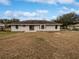 Large backyard with patio and plenty of space for outdoor activities at 5803 Sw 107Th St, Ocala, FL 34476