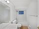 Clean bathroom with a bathtub, toilet and sink at 5803 Sw 107Th St, Ocala, FL 34476