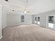 Spacious Gathering room with large windows and access to patio at 5803 Sw 107Th St, Ocala, FL 34476