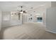 Open living room with high ceilings and a view of the backyard at 5803 Sw 107Th St, Ocala, FL 34476