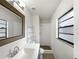 Clean bathroom with a shower, toilet, and vanity at 6117 Oakcrest Cir, Orlando, FL 32808