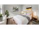 Cozy bedroom with light wood furniture and large window at 6117 Oakcrest Cir, Orlando, FL 32808