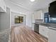 Bright kitchen featuring stainless steel appliances, and tile flooring at 6117 Oakcrest Cir, Orlando, FL 32808