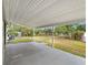 Covered patio provides shaded outdoor space at 6117 Oakcrest Cir, Orlando, FL 32808